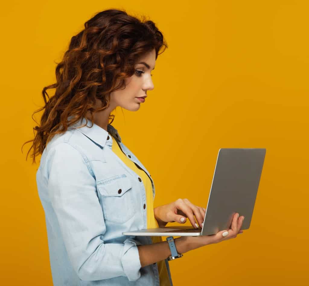 researching furnaces on laptop